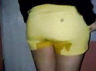 Latina in Yellow Shorts