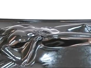 Wonderful hot rubber girl in full encased in black latex catsuit enjoys her vacuum bed vacbed