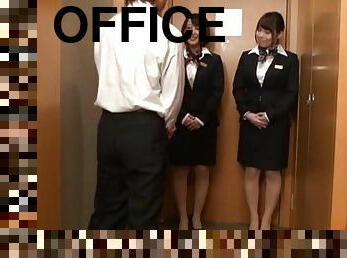 Two kinky office girls are playing with their boss