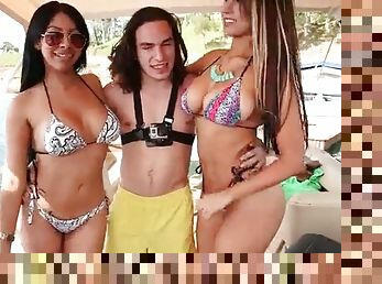 Bikini girls flash fat asses on a boat