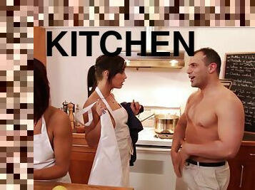 Charming brunettes strip and wear chef outfits in reality kitchen shoot
