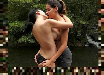 Lesbian Saraya and her girl get naked on a lake and go naughty
