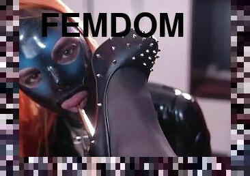 BDSM play with a latex doll. Feminization, facesitting, heels sucking, legs kissing, spitting.