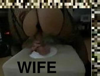 Wife play double toy on the table