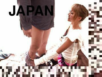 Japanese babe Rio Sakura in stockings gives her dude a cute blowjob