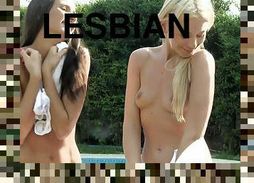 Muff diving time with two lesbians poolside outdoors