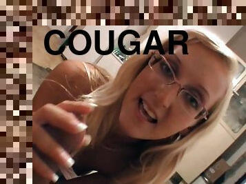 Accepting cougar in glasses giving out a nasty handjob in POV