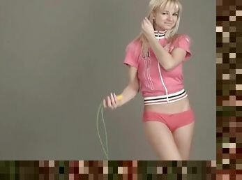 Blonde teen jumps rope and strips naked