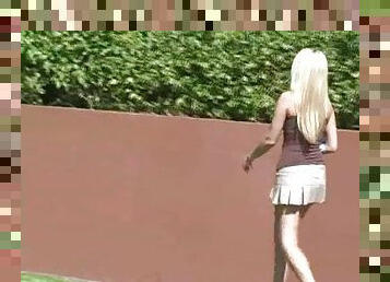 Alison Angel fingers her pussy in a park and flashes her butt