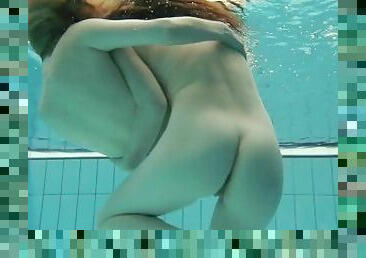 Nastya undresses Libuse in the pool like a lesbian