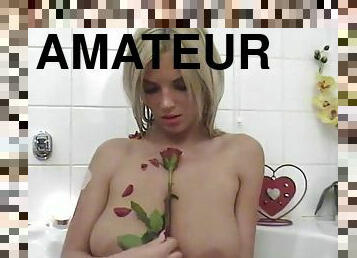 Cutest amateur blonde with perfect tits takes a bath with roses