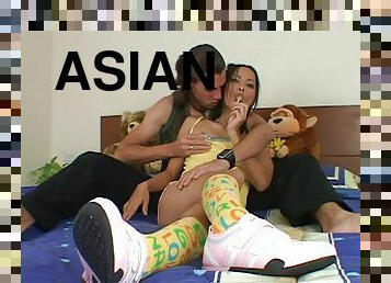 Dynamic Asian teen in socks giving massive dick superb blowjob in amateur shoot
