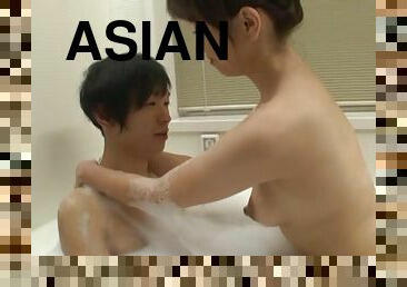 Bathing with a stunning Asian chick, who loves handjob