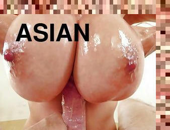 Voluptuous Asian bitch with enormous tits is a raging cum slut