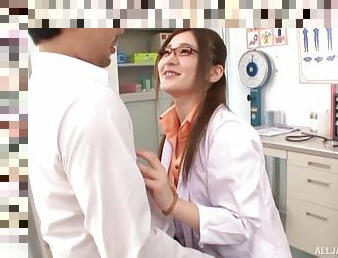 Japanese cutie with glasses gets frisky with a dick