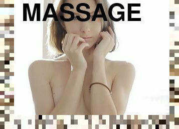 Pale chick gets an erotic kind of massage in the early morning