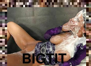 Nicely dressed blonde with big tits gets covered in goo at a gloryhole