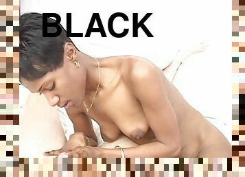 A pretty black lady with a cute, tight ass riding a big white cock