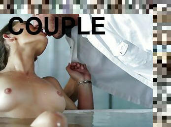 Couple in the bath together having beautiful sex