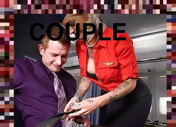 Tattooed flight attendant gives a guy in first class some pussy