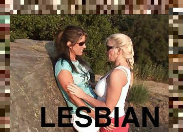 Lovely lesbian couple gets on heat at the field and rushes to neutralize the fuzzy feeling