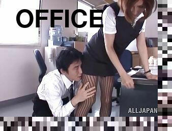 Emily Takahash blows one of her coworkers in the office