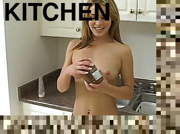 Cute blonde plays with her BF's cock in the kitchen in POV clip