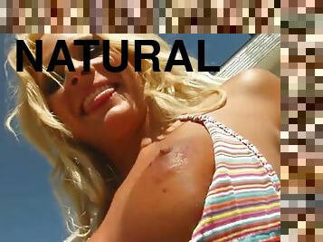 Tanned blonde babe in a bikini rides a dick in a POV video