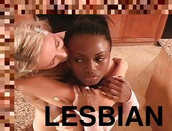 Slim girls toy their pussies in a lesbian interracial sex video