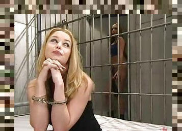 Holly Morgan gets toyed and dominated by Sasha Sparks in a prison