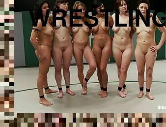 A few nude chicks have a wrestling match on tatami