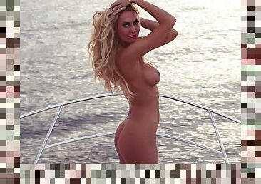 Gorgeous Jennifer Vaughn poses naked on a yacht