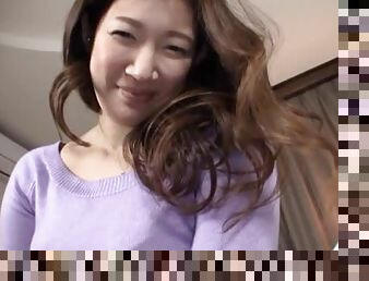 Hot Japanese milf enjoys sucking a cock in the bedroom