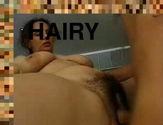 Hairy mature pussy is enjoying the pleasures