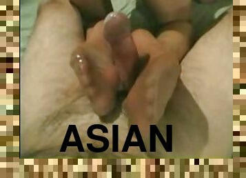 Hot Asian slut gives a footjob and gets cum on her pantyhose