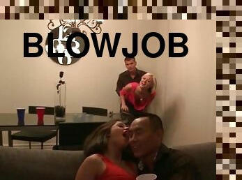 Sexy blonde teen giving blowjob at college orgy party