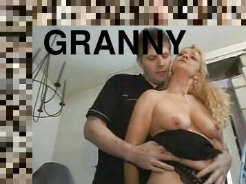 Blonde granny Bea Dumas has doggy style sex and gets cum on her tits