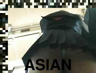 Asian girl shows her nice ass in some crowded public place