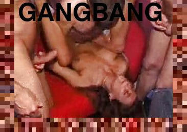 Slutty brown-haired woman gets gangbanged in a rough manner