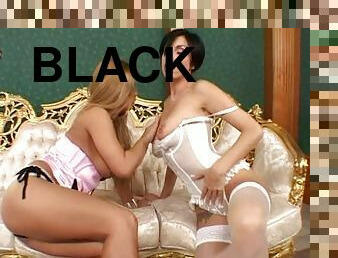 Dorothy Black and Eva Black stuff each other's butts with dildos