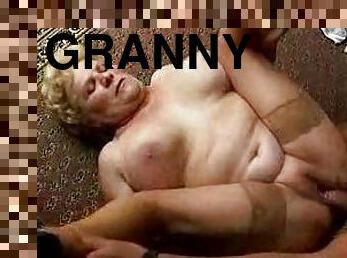 Lewd granny sucks a cock and gets fucked in the hall