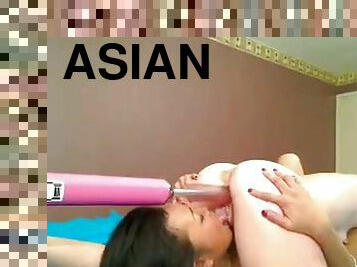 Blonde and asian lesbian girls with toys being naughty