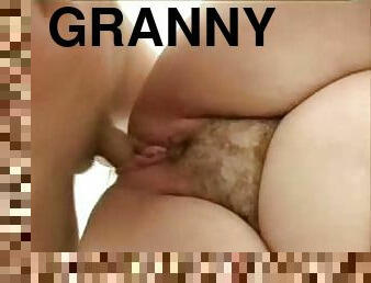 Redhead granny blows and gets her pussy drilled in the bathroom