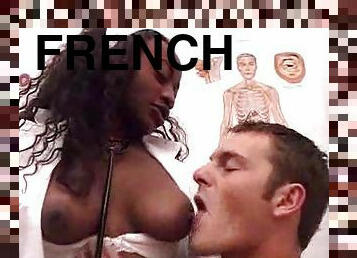 French black nurse gets sucks a white cock before taking it in her ass