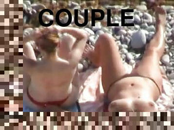 Horny couple are having fun with each other on the beach