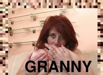 Chubby redhead granny enjoys pleasuring her wet pink slit