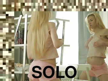 Long hair blonde solo model showcasing her nice ass