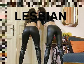 Two chicks wearing latex clothes are ready to expose their booties