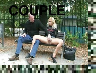 Horny couple fucking on public bench