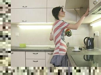 Brunette preparing breakfast then shading miniskirt for hardcore bangs